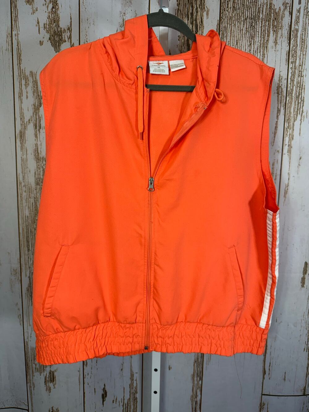 Cheetah, Neon Orange/Coral Sleeveless Windbreaker. Size 2X. Good used condition!